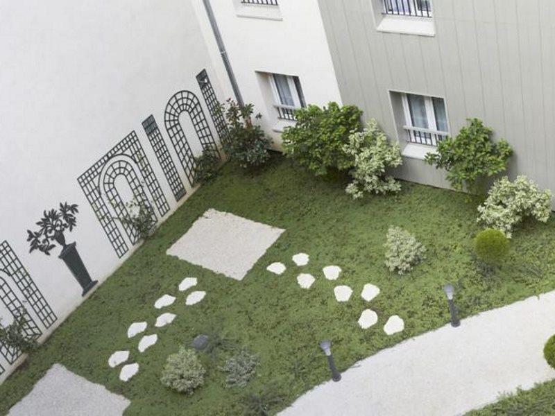 Kyriad Paris 18 - Porte De Clignancourt - Montmartre Exterior foto